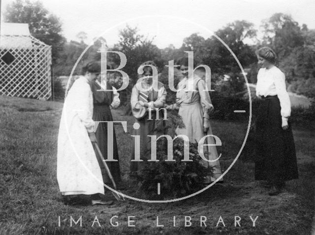 Suffragette Vera Wentworth planting tree with Millicent Brown, Annie Kenney, Mary Phillips and Elsie Howey 1909